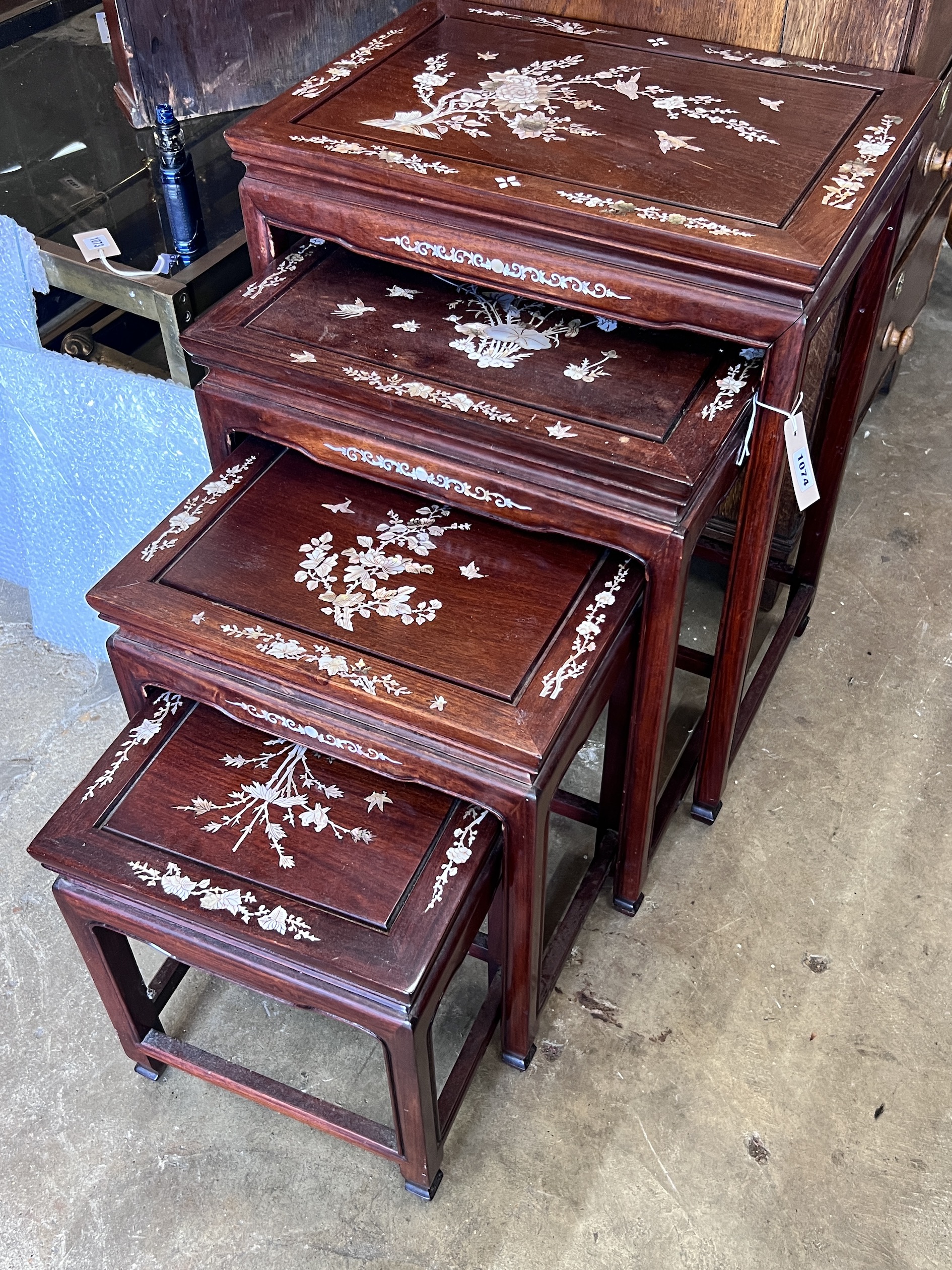 A quartetto of Chinese mother of pearl inlaid rectangular hardwood tea tables, width 51cm, depth 36cm, height 66cm